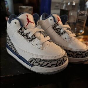 Kids Jordan White and Blue Sneakers